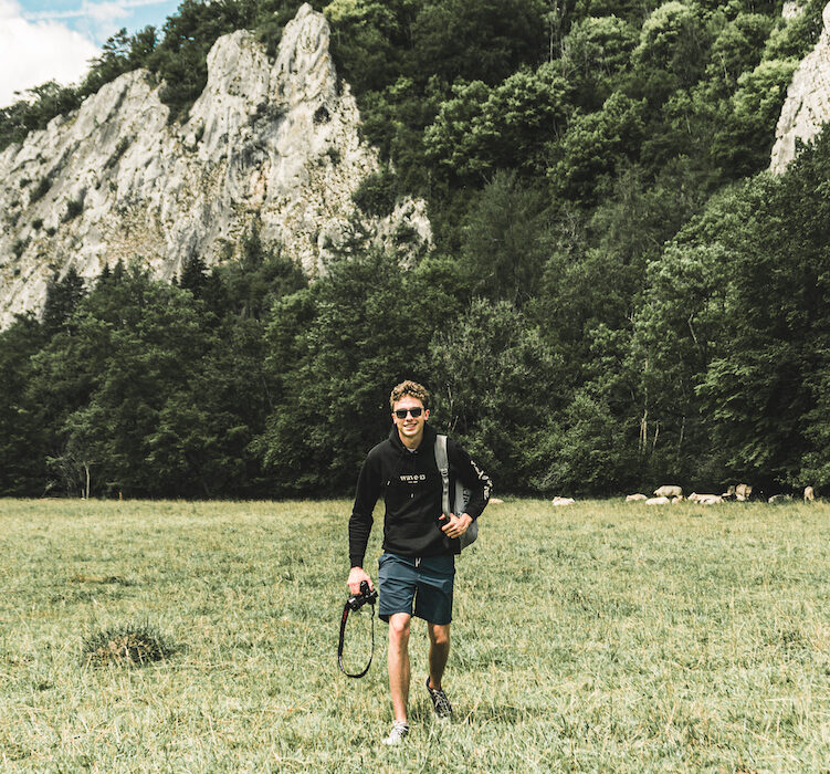 Pieter De Malsche exploring Dinant and walking next to river the Lesse